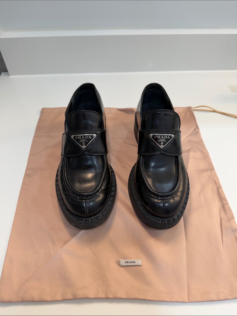 Prada Black Leather Lug-Sole Penny Loafers